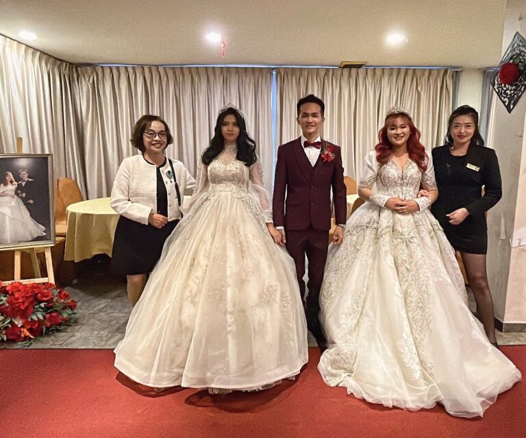 Non Muslim marries two women